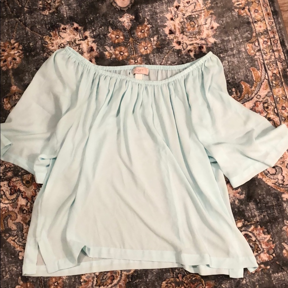 light blue loft top.worn off shoulder or above